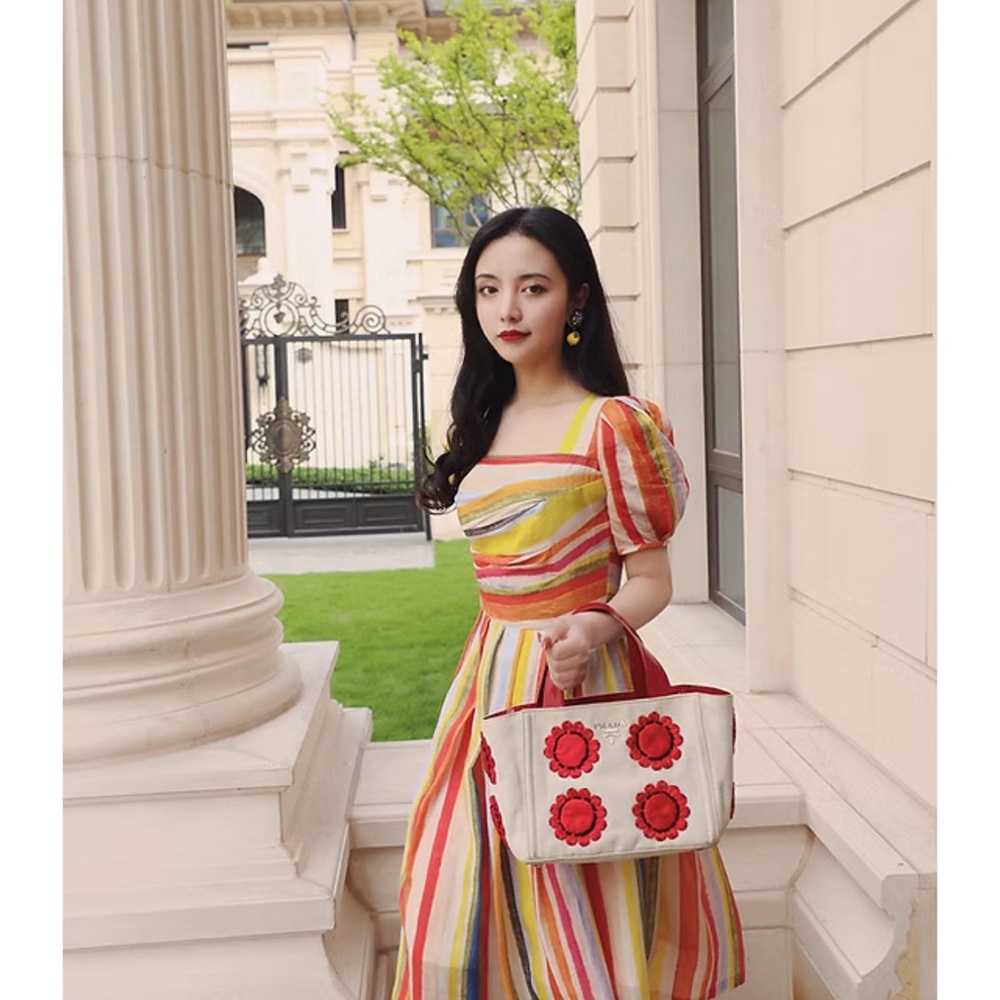 Vintage-look rainbow striped midi dress with puffed short sleeves. Never worn!